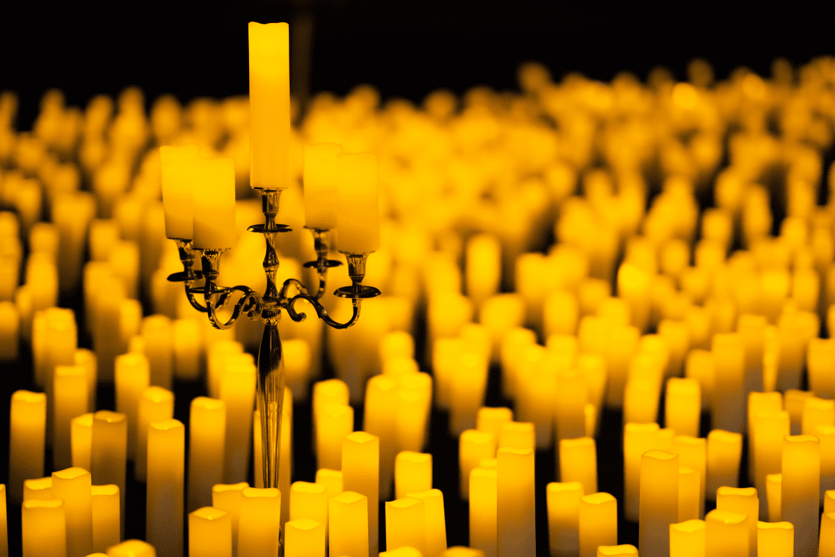 A sea of candles flickering 